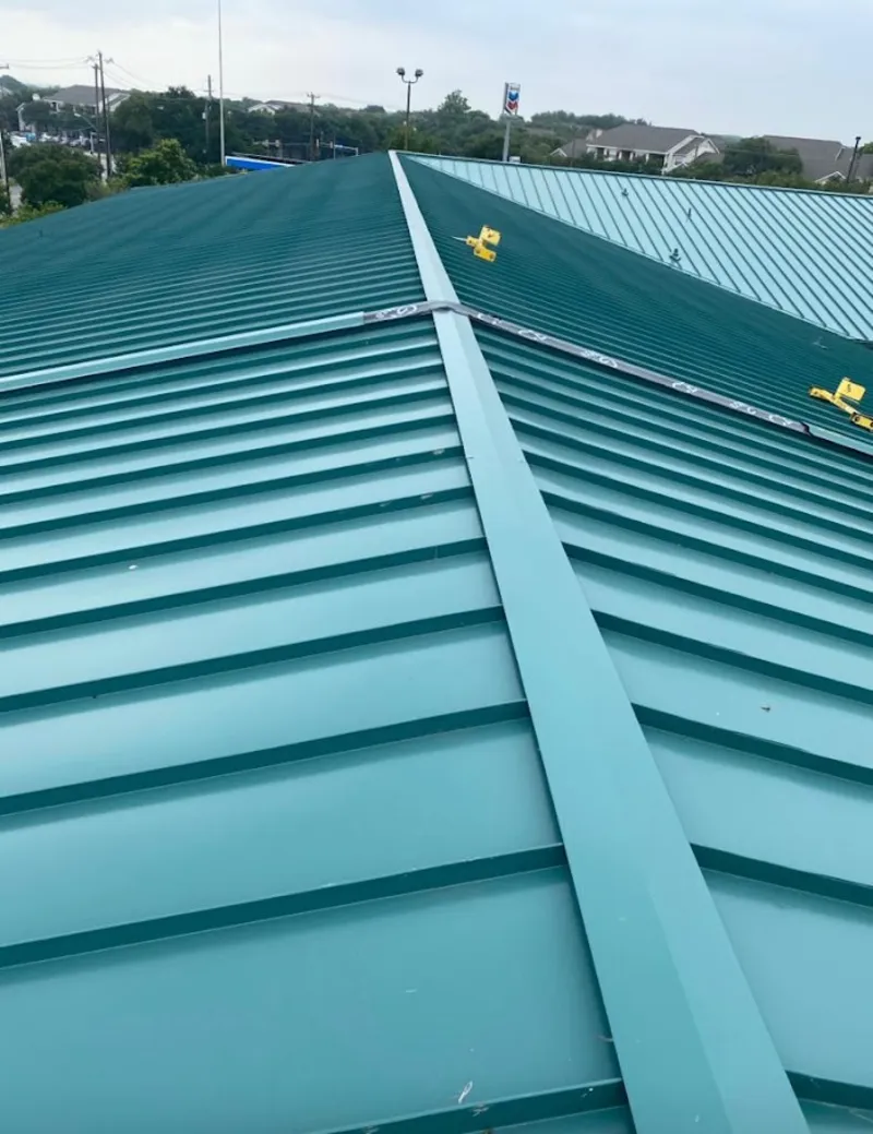 Green commercial metal roof ridge and valley for Metal Roof Repair in Mount Hood Villages